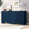 Buffet quatre portes à côtés striés avec poignées dorées et base ondulée, bleu blanc noir