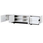 Meuble TV brillant blanc et noir avec tiroirs et placards