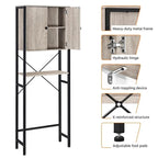Meuble de rangement WC en bois gris et cadre en métal noir avec étagère ouverte et porte fermée