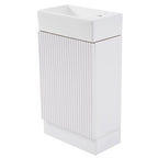 Petit meuble-lavabo de salle de bain avec évier en céramique et étagères ouvertes