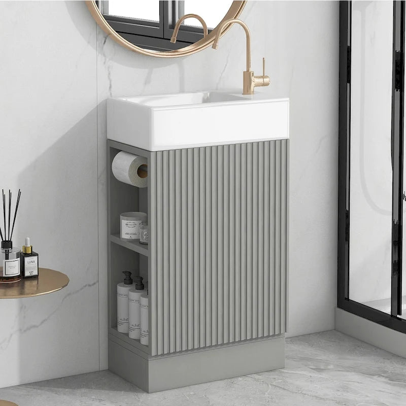 Petit meuble-lavabo de salle de bain avec évier en céramique et étagères ouvertes